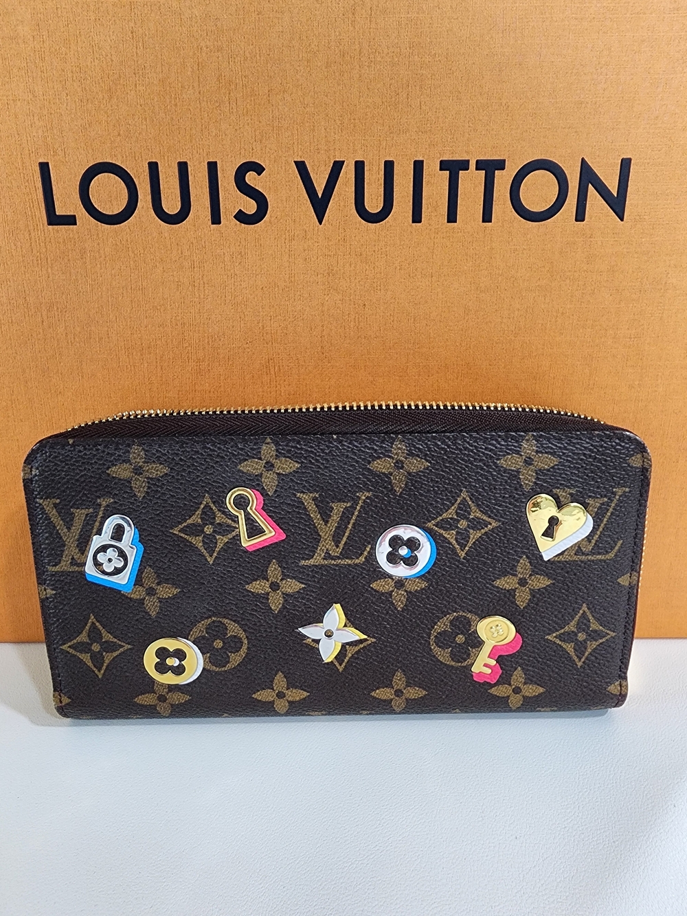 Louis Vuitton Monogram Love Lock Zippy Wallet
